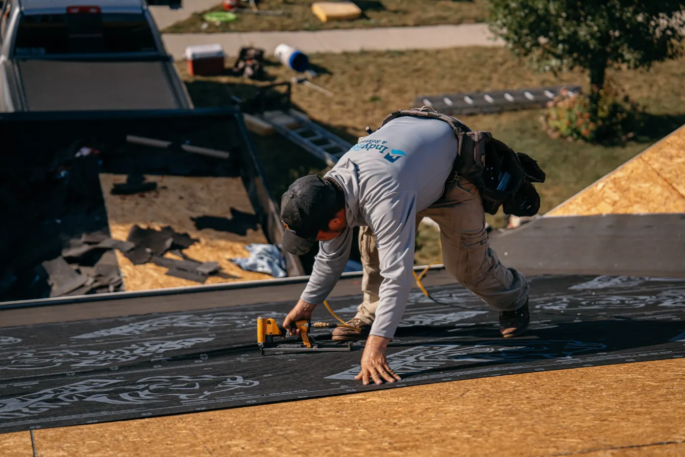 Tarping and dry-in on a Shirley commercial roof